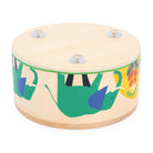 Wooden drum with dinosaur illustrations on a white background