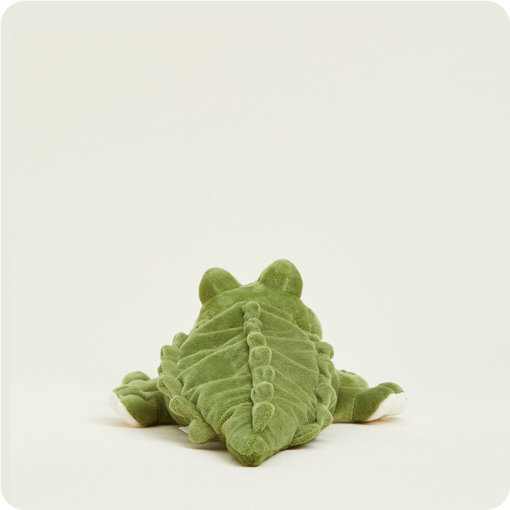 Green plush frog toy on a white background