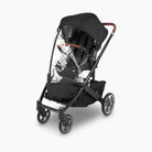 Black stroller with clear rain cover on a white background