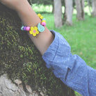 Colorful bracelet on a wrist against a natural background
