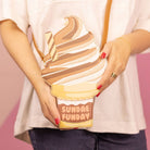 Ice cream sundae-shaped purse with 'Sundae Funday' text held by a person.