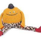 Plush toy with a yellow face, black hat, and leopard print pants on a white background