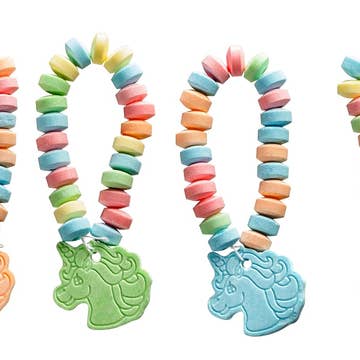 A set of pastel rainbow candy-bead necklaces with unicorn-shaped charms, shown on a plain white background.