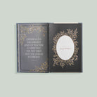 Decorative book with a quote on a light gray background