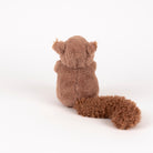 A brown plush squirrel toy shown from the back, featuring a fluffy tail and small ears, photographed on a seamless white background.