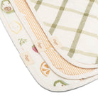 Set of baby burp cloths with different patterns on a white background