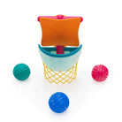 Colorful toy basketball hoop with three balls on a white background