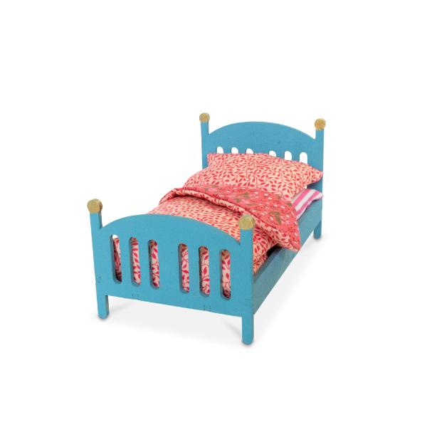 Blue doll bed with pink bedding on a white background