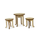 Set of three wooden stools on a white background