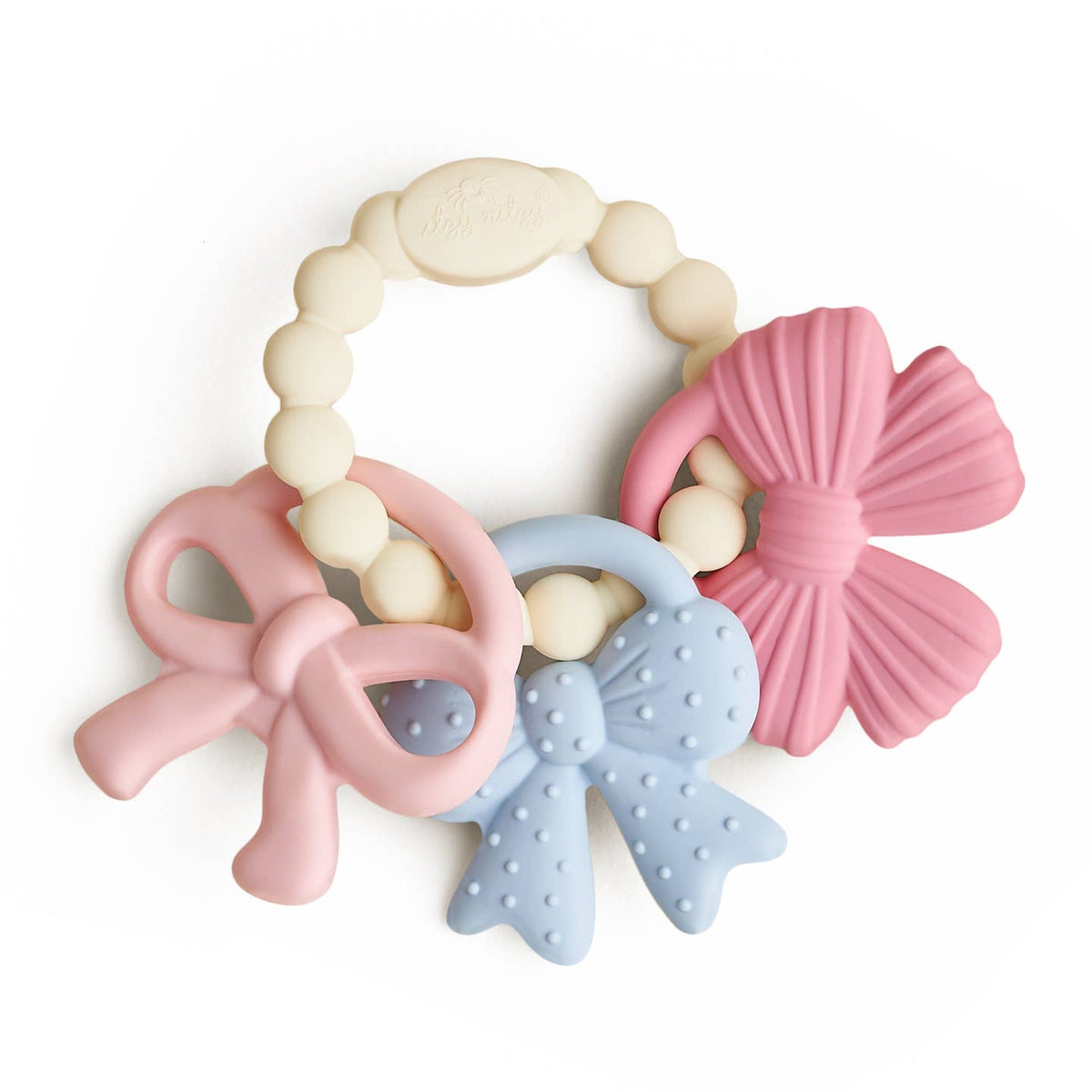 Set of three colorful baby teething rings on a white background