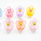 Colorful flower-shaped objects on a white background