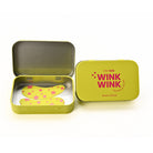 Yellow and pink eye patches with 'Wink Wink' branding on a white background