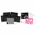 Coloring books and stencils with markers on a white background