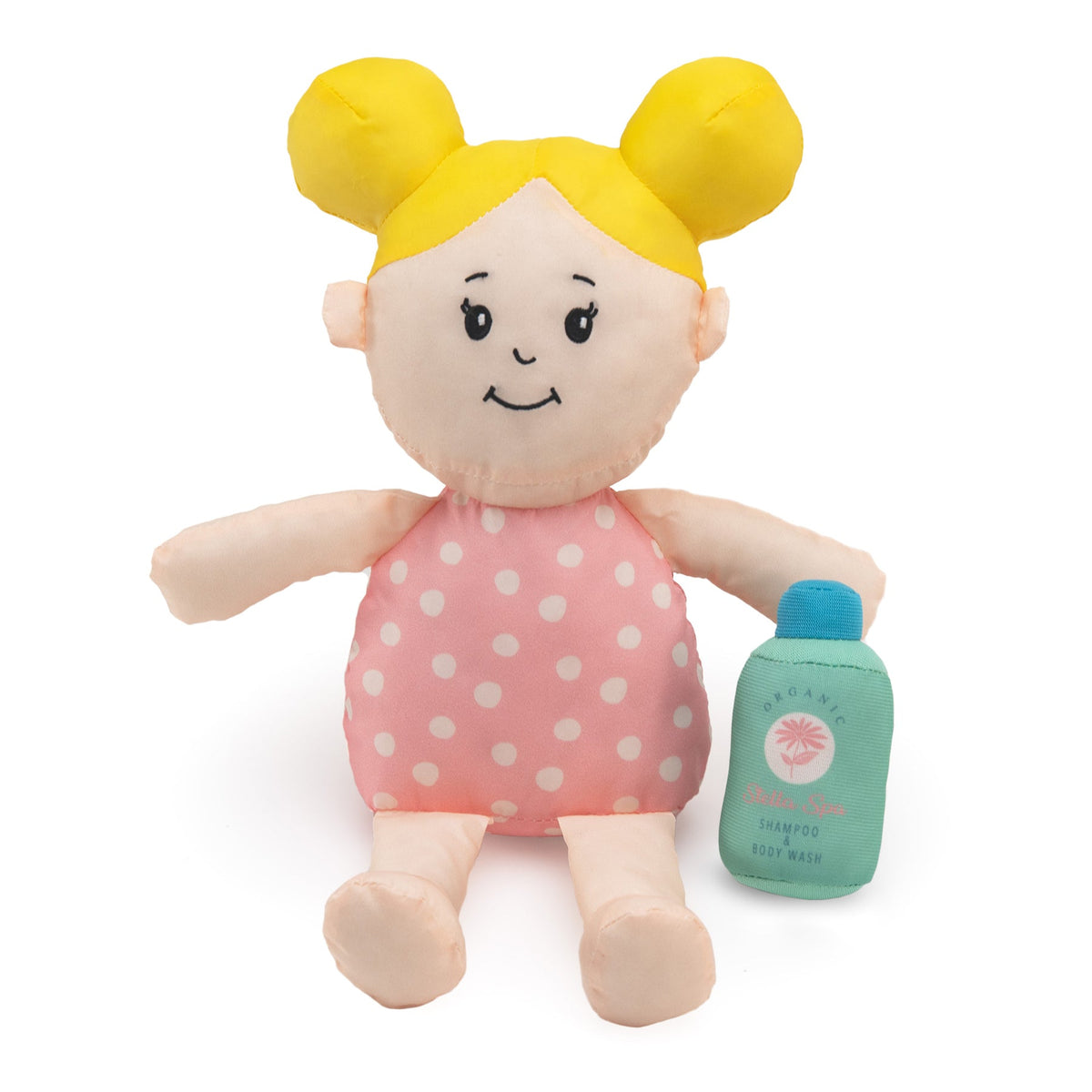 A soft plush doll with bright yellow hair styled in two buns, an embroidered face, a pink polka-dot outfit, and an accompanying miniature blue toy bottle standing next to it.