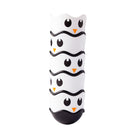 White and black toy with owl design on a white background
