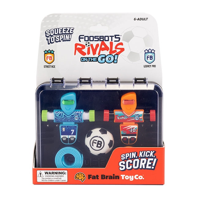 Foodbots Rivals on the Go! toy set by Fat Brain Toy Co. in its original retail packaging, featuring two small soccer-themed scorekeeping devices in blue and orange, a small soccer ball, and a blue strap.