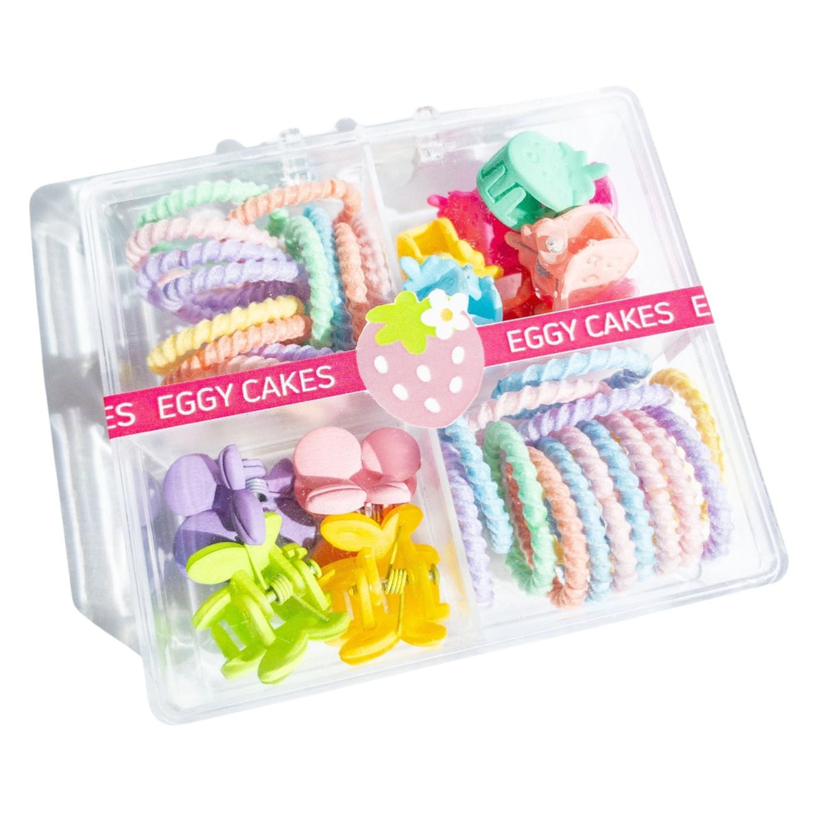 Set of colorful hair ties in a clear plastic container with 'Eggy Cakes' branding.