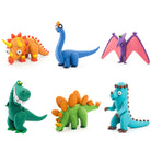 Set of colorful dinosaur figurines on a white background