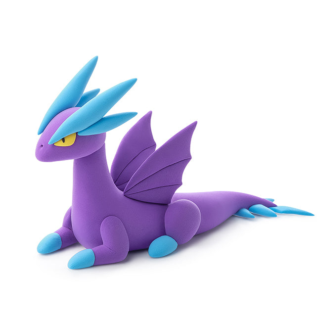 Purple dragon toy with purple accents  on a white background