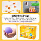 Promotional collage for the Pet Brain Toy Co. Air Tooz B70 Air Play Ball set, showing the clear acrylic tube toy with orange balls, a hand holding a purple foam ball, the product box, and a rechargeable orange-and-white controller on a yellow background with feature callouts.