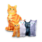 Four cat-shaped novelty items or cushions displayed on a plain white background, including two orange tabby designs and two gray and white cat designs.