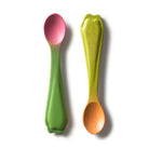 Two wooden spoons with gradient colors on a white background