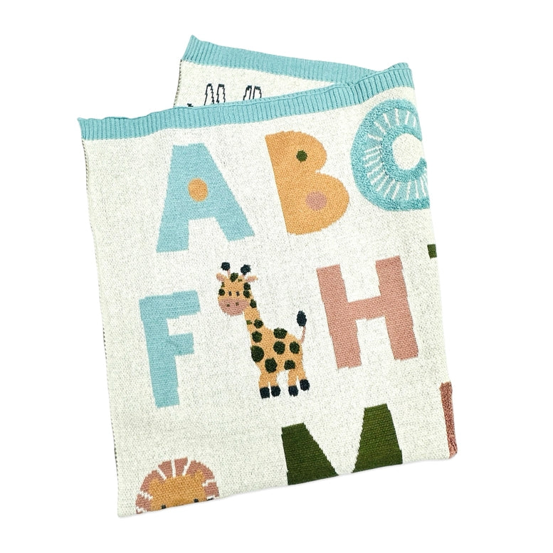Children's blanket with alphabet letters and animal illustrations on a white background