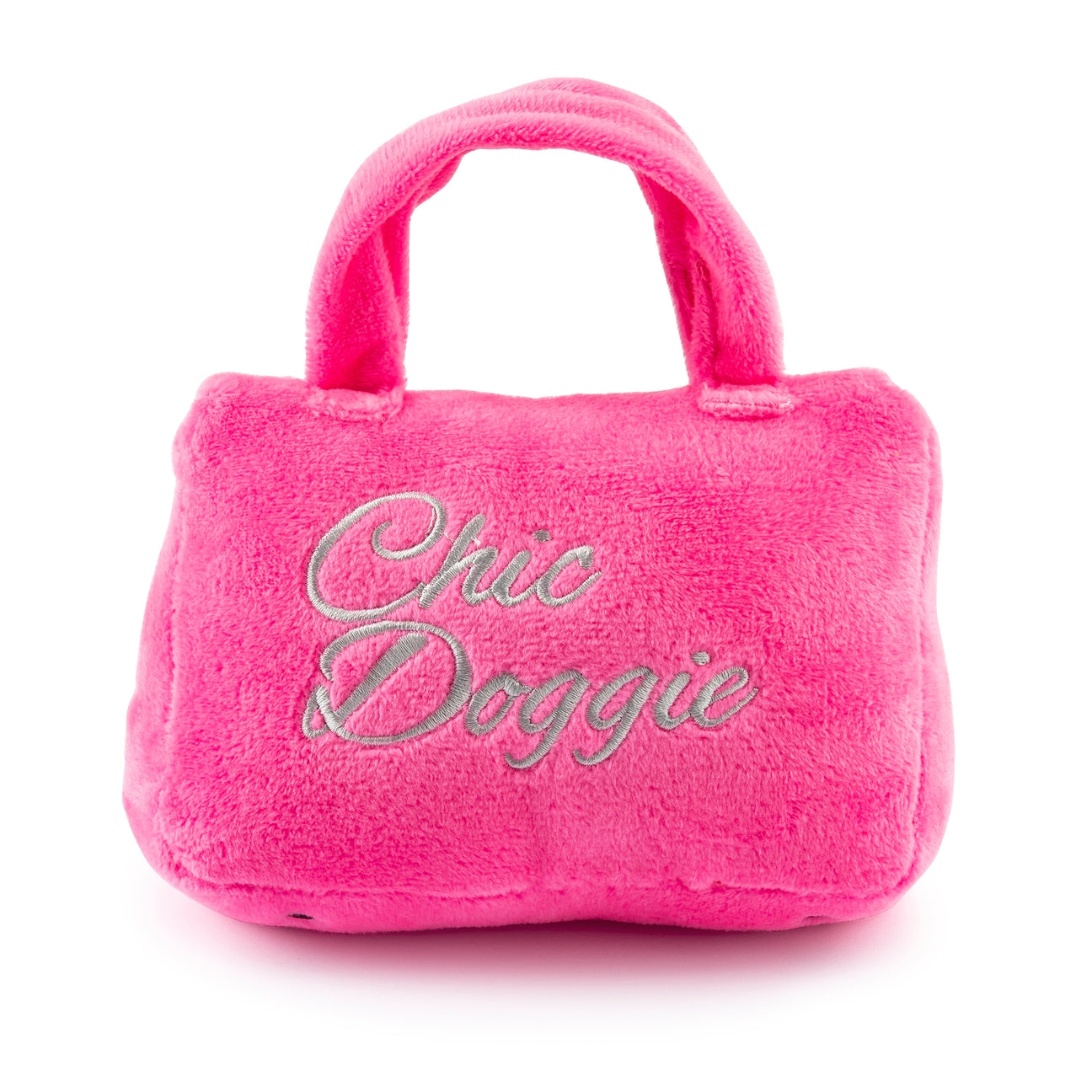 Pink plush toy resembling a handbag with 'Chic Doggie' text on a white background