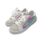 White sneakers with glittery silver sole and rainbow star design on a white background