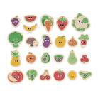 Set of wooden fruit and vegetable toys with faces on a white background