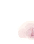 Pink knitted hat on a white background