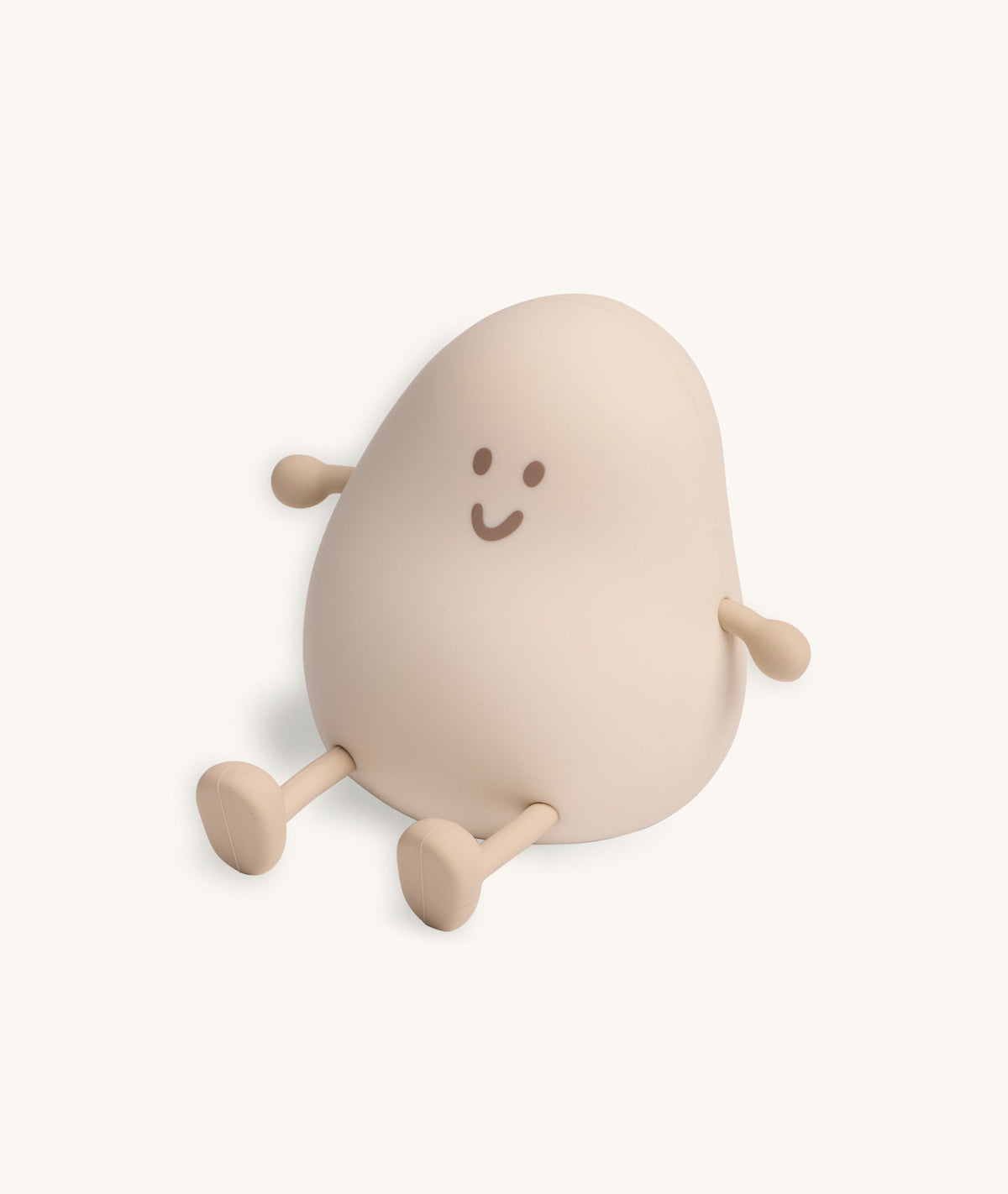 Beige plush toy with a happy face on a white background