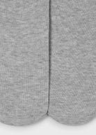 Close-up of gray socks on a white background