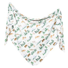 A white triangular swaddle featuring an all-over print of forest animals like bears, deer, and foxes, along with pine trees, shown against a plain white background.