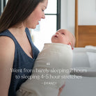 Woman holding a baby with a quote about sleep duration.