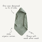 Green hooded towel with text describing its features on a white background