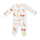 A baby footed sleeper with long sleeves and an all-over whimsical peanut butter and jelly theme print on a white background.