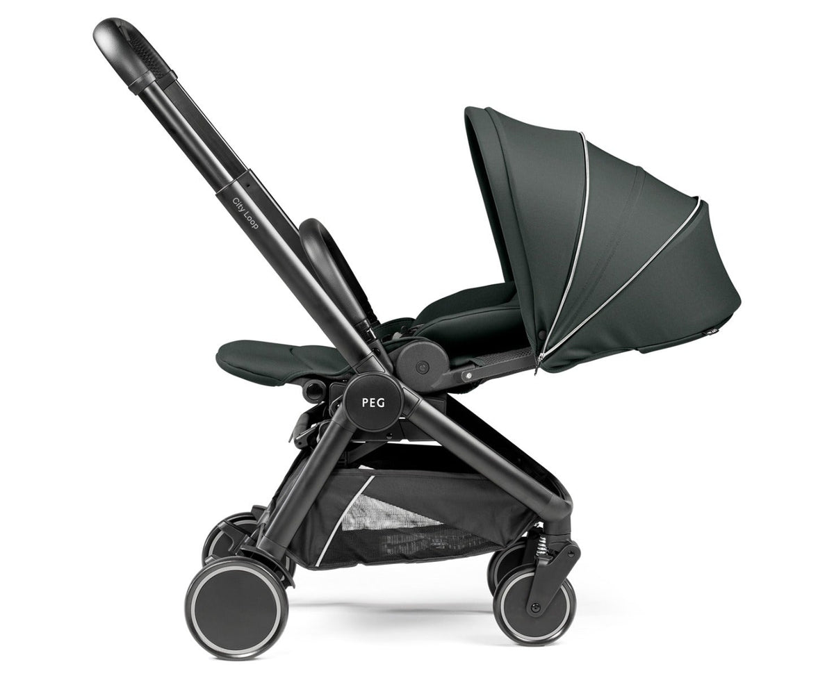 Dark forest green stroller on a white background