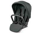 A Peg Perego infant car seat in a black fabric with a black handle and black harness straps, shown on a clean white background.