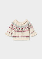 Knitted sweater with a pattern on a white background