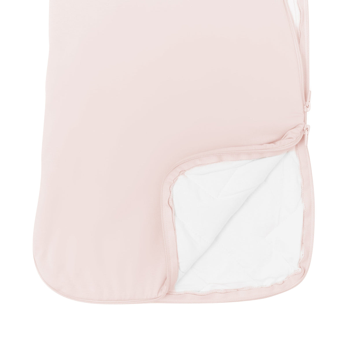Pink baby sleeping bag with white lining on a white background
