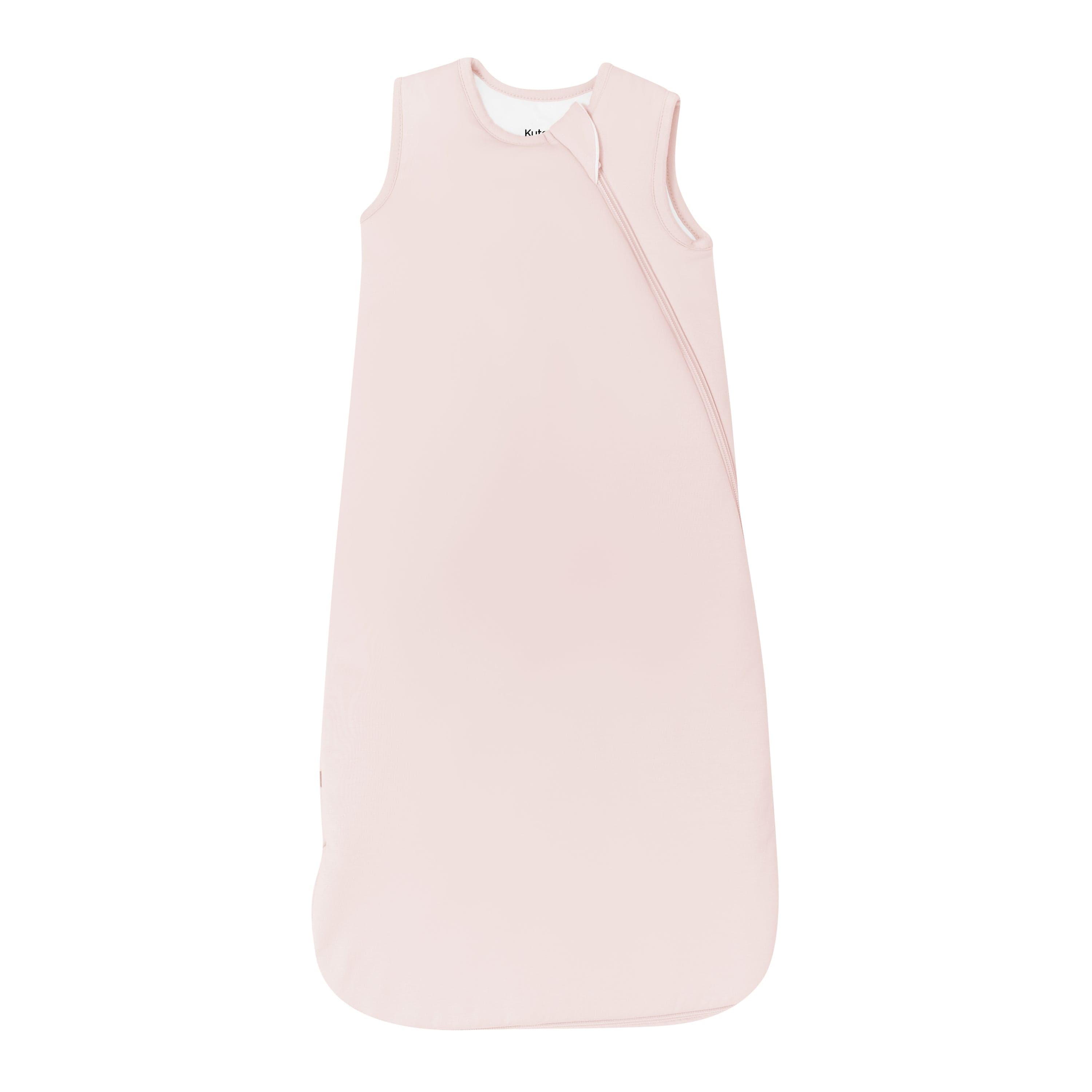 A sleeveless baby sleep sack in a very pale blush pink color, shown flat against a solid white background.