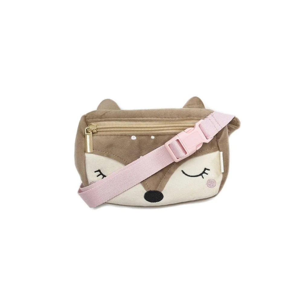 A small crossbody bag designed like a sleeping fox face, featuring a brown top half, a cream-colored lower half with embroidered closed eyes, a black nose, and a light pink adjustable strap.