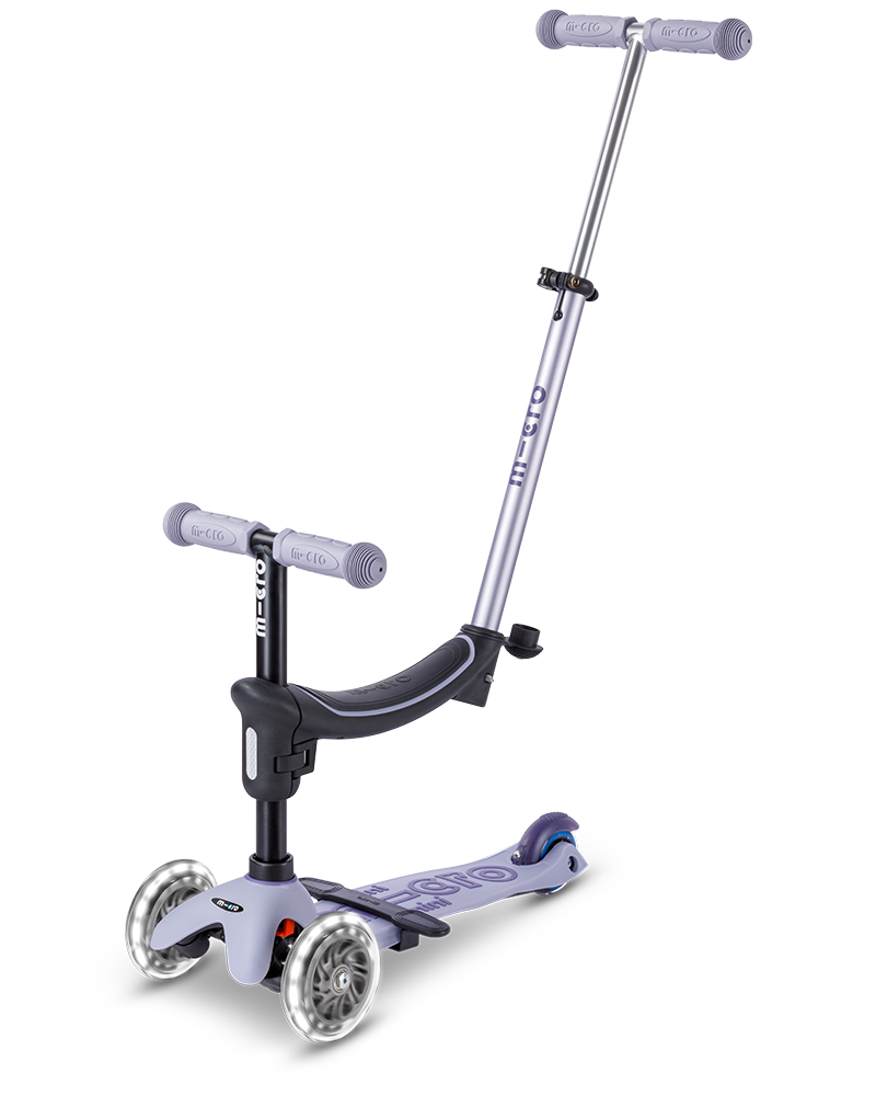 Children's scooter with handlebar and large wheels on a white background