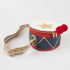 Meri Meri Drum Bag, a drum-shaped children's handbag inspired by traditional Nutcracker costumes.