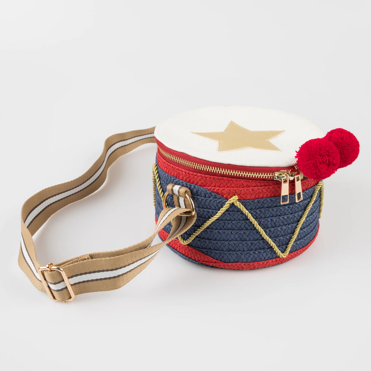  Meri Meri Drum Bag, a drum-shaped children's handbag inspired by traditional Nutcracker costumes.