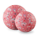 Two pink exercise balls with unicorn patterns on a white background