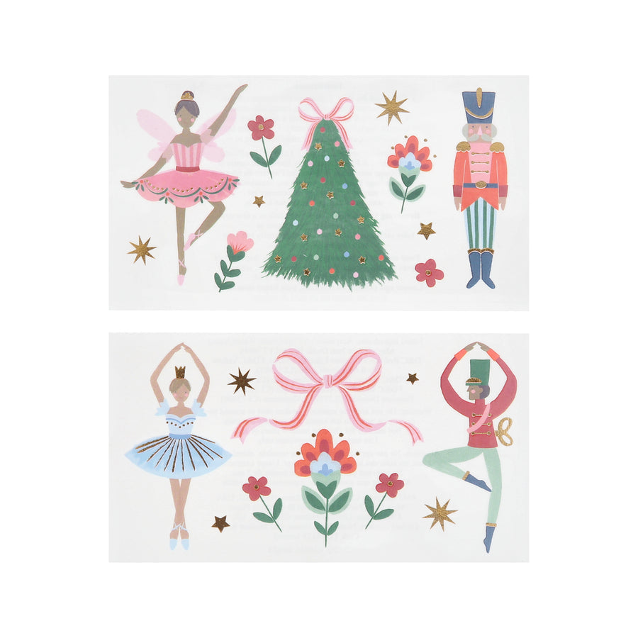 Set of Christmas-themed stickers featuring ballerinas, a tree, and a nutcracker on a white background.