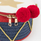  Meri Meri Drum Bag, a drum-shaped children's handbag inspired by traditional Nutcracker costumes.