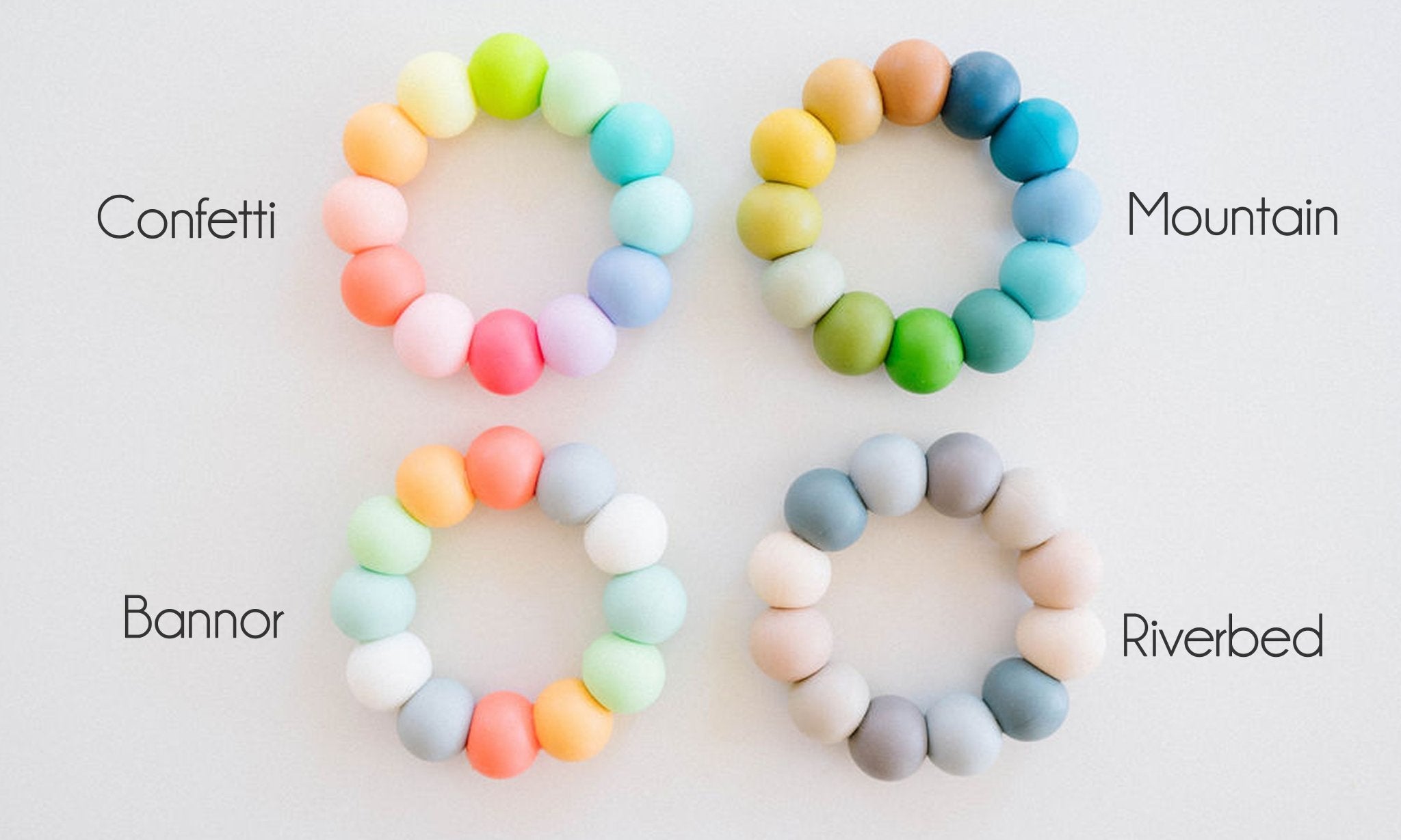 Four colorful beaded bracelets labeled 'Confetti', 'Mountain', 'Banner', and 'Riverbed' on a white background.